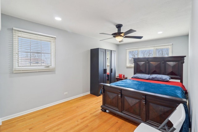 bedroom featuring light wood-style flooring, recessed lighting, baseboards, and a ceiling fan