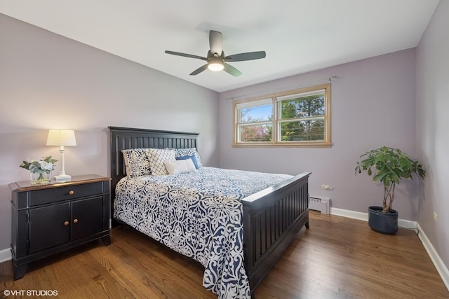 1112 N Perry Dr, Palatine, IL 60067 - bedroom with wood finished floors, baseboards, a baseboard heating unit, and ceiling fan