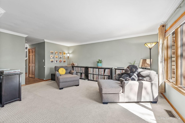 carpeted living room with visible vents, baseboards, and crown molding