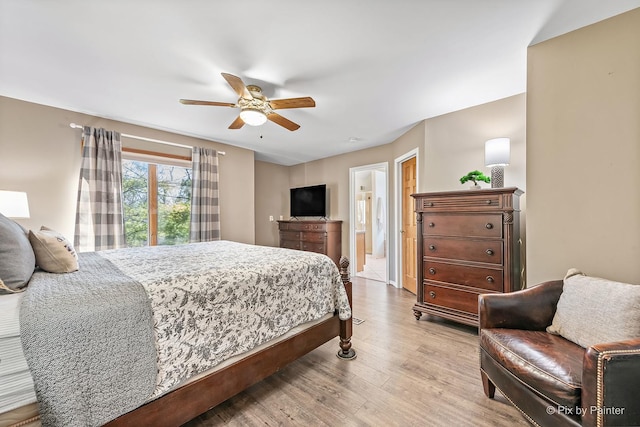 bedroom with ceiling fan and wood finished floors