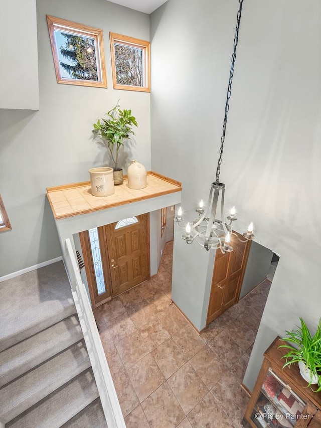 entrance foyer with a notable chandelier