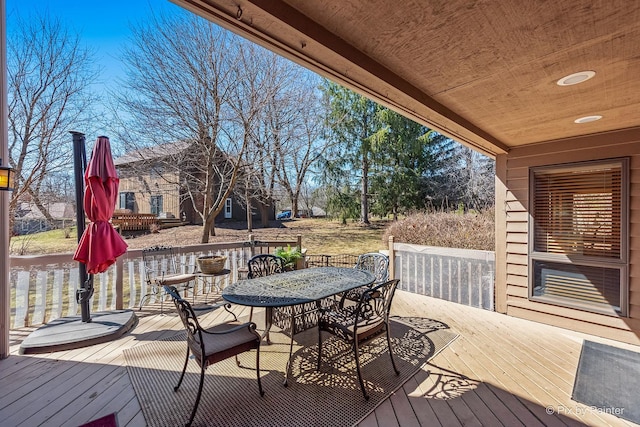 deck featuring outdoor dining space
