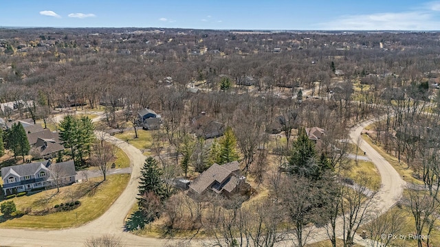 bird's eye view featuring a view of trees
