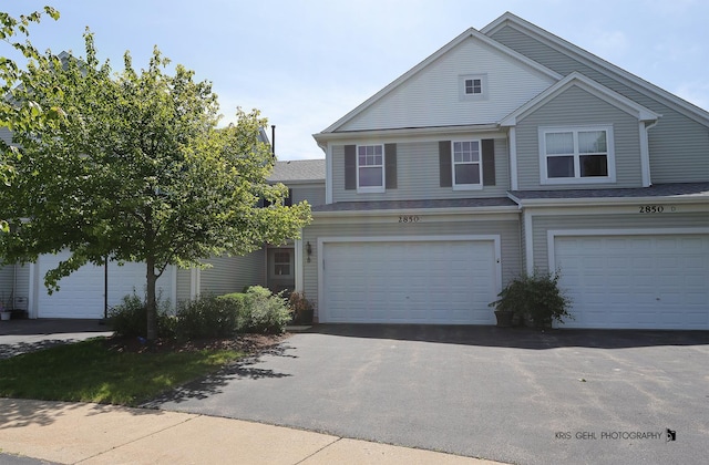 2850 Cattail Ct Unit C, Wauconda, IL 60084 - view of front facade with asphalt driveway and a garage