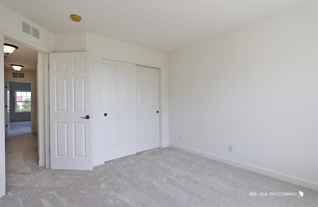 2850 Cattail Ct Unit C, Wauconda, IL 60084 - unfurnished bedroom with carpet flooring and a closet