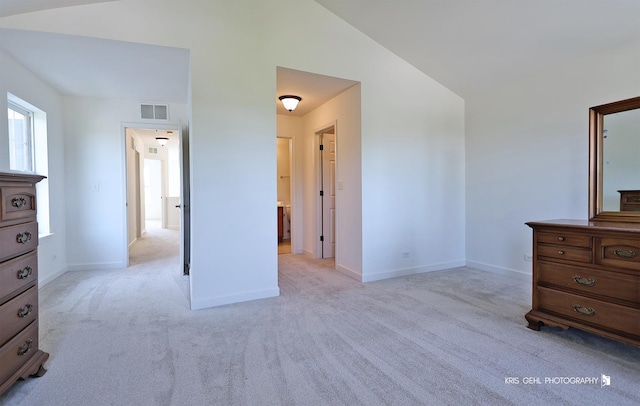 2850 Cattail Ct Unit C, Wauconda, IL 60084 - carpeted bedroom featuring baseboards and lofted ceiling