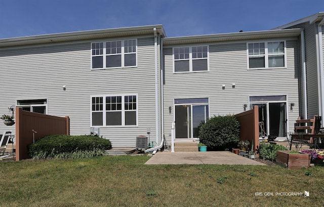 2850 Cattail Ct Unit C, Wauconda, IL 60084 - rear view of property with a yard, entry steps, and a patio area