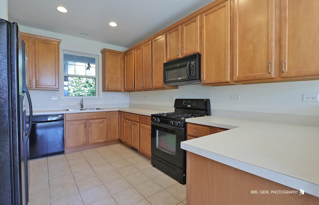 2850 Cattail Ct Unit C, Wauconda, IL 60084 - kitchen featuring black appliances, light tile patterned flooring, light countertops, recessed lighting, and brown cabinets
