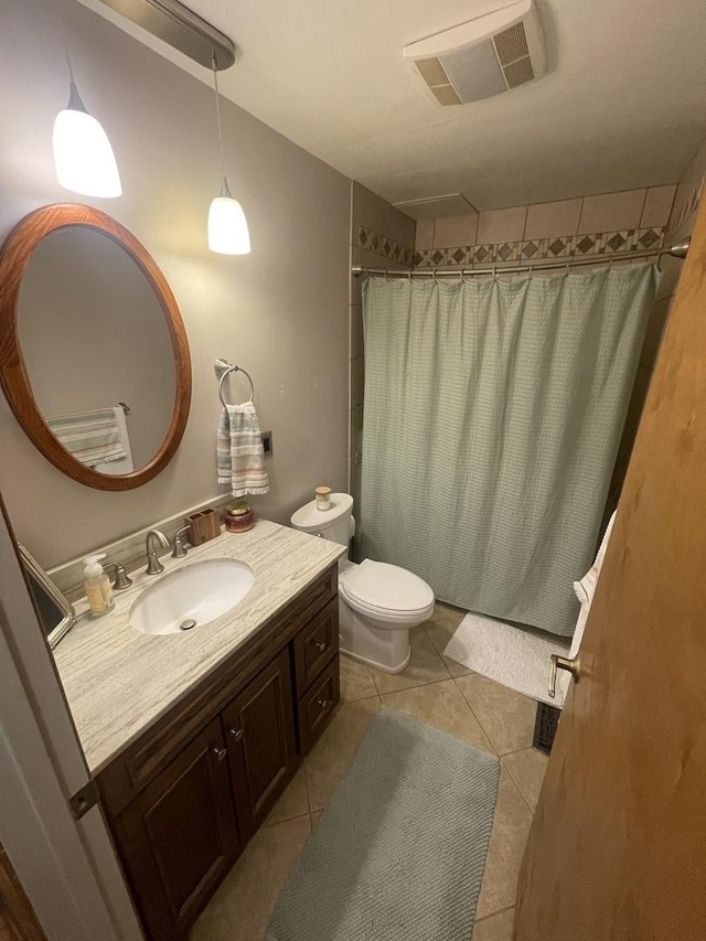 full bath with toilet, tile patterned floors, visible vents, and vanity