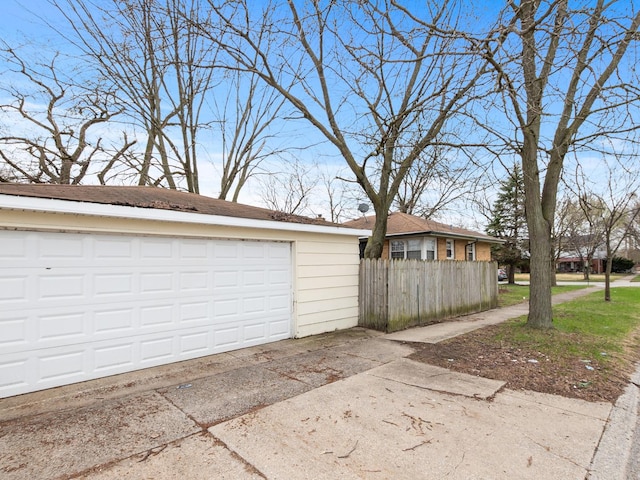detached garage with fence