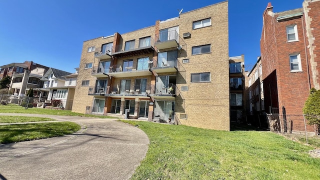 5424 W Ferdinand St Unit 104, Chicago, IL 60644 - view of building exterior with fence