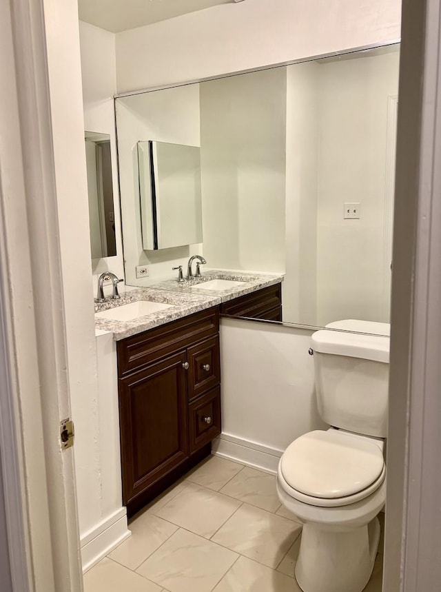 5424 W Ferdinand St Unit 104, Chicago, IL 60644 - bathroom featuring toilet and vanity