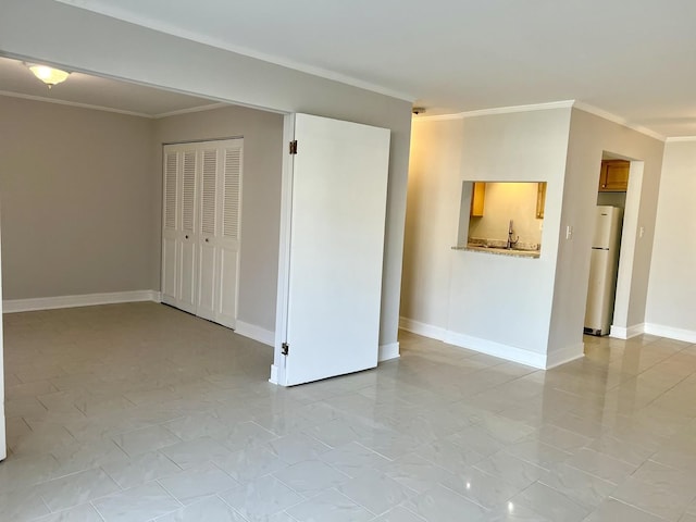 5424 W Ferdinand St Unit 104, Chicago, IL 60644 - empty room with baseboards and crown molding