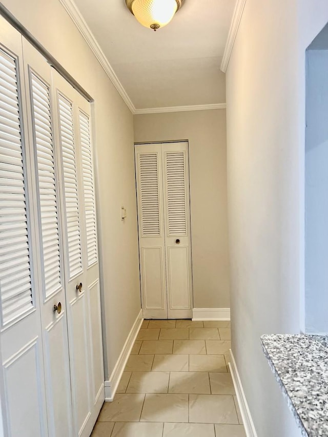 5424 W Ferdinand St Unit 104, Chicago, IL 60644 - hall featuring light tile patterned floors, baseboards, and crown molding