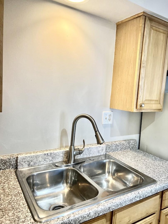 5424 W Ferdinand St Unit 104, Chicago, IL 60644 - interior details featuring a sink and light brown cabinetry