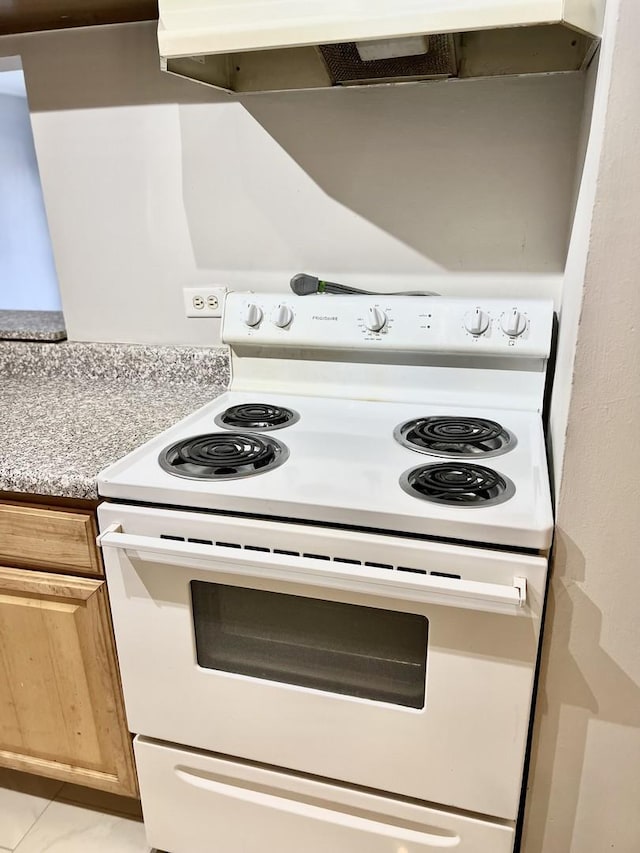 5424 W Ferdinand St Unit 104, Chicago, IL 60644 - kitchen with under cabinet range hood, marble finish floor, white electric range, and light countertops