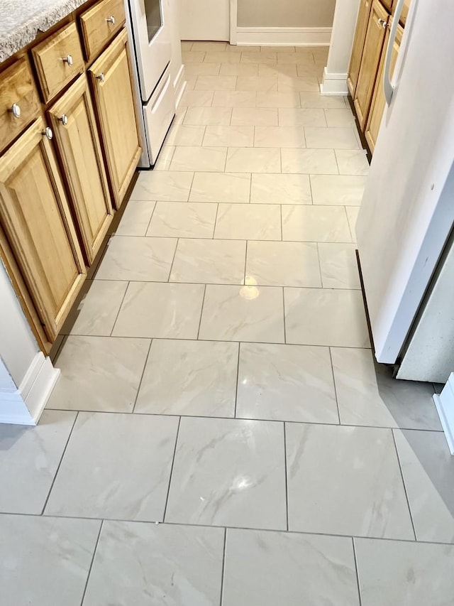5424 W Ferdinand St Unit 104, Chicago, IL 60644 - details with range, refrigerator, and light stone countertops