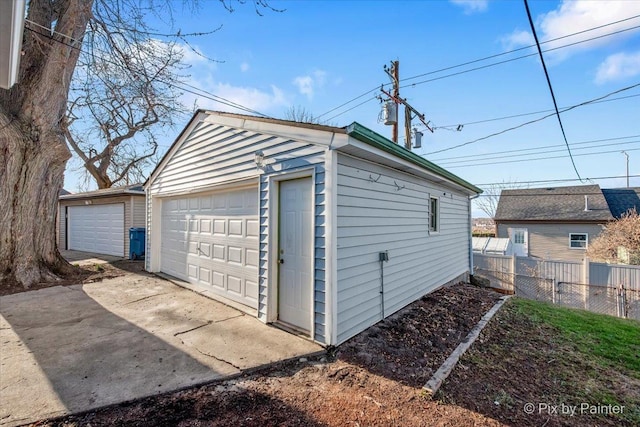 128 Adobe Cir, Carpentersville, IL 60110 - detached garage featuring fence