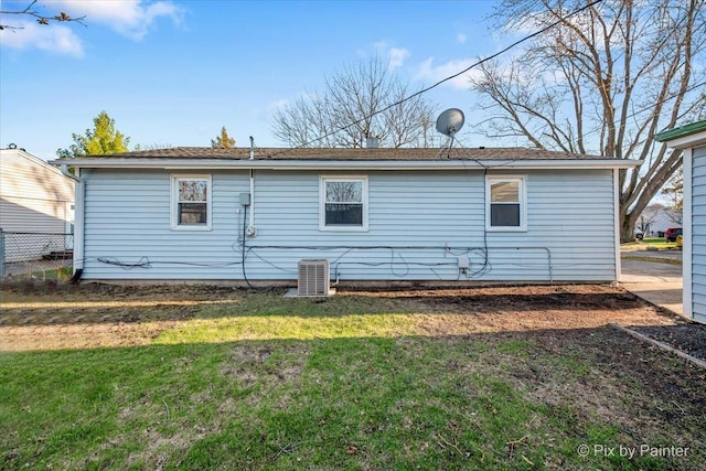 128 Adobe Cir, Carpentersville, IL 60110 - back of property featuring central air condition unit and a yard