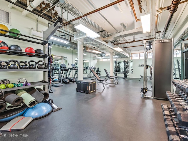 exercise room featuring visible vents