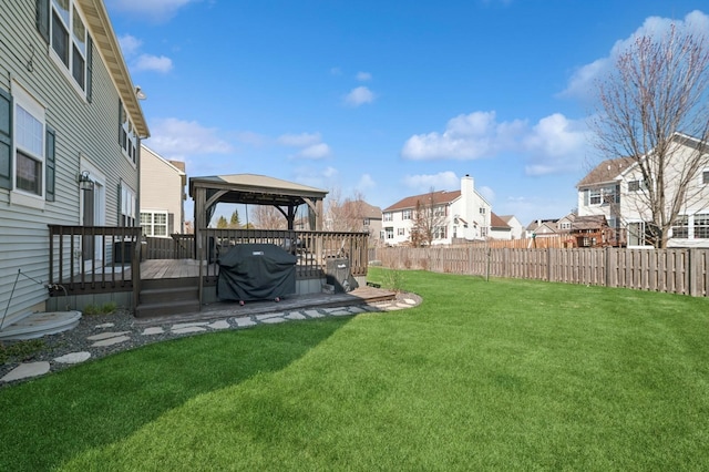 201 Valencia Pkwy, Gilberts, IL 60136 - view of yard with a gazebo, a residential view, a wooden deck, and fence