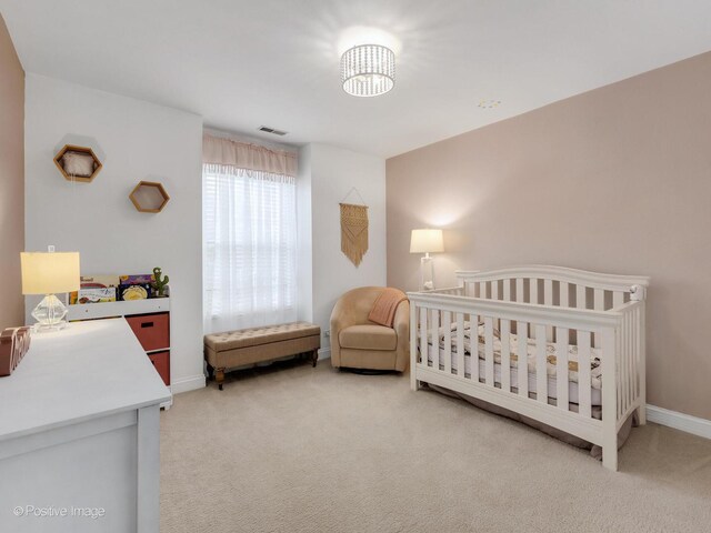 14 Wildflower Way, Streamwood, IL 60107 - bedroom with carpet, baseboards, and a nursery area