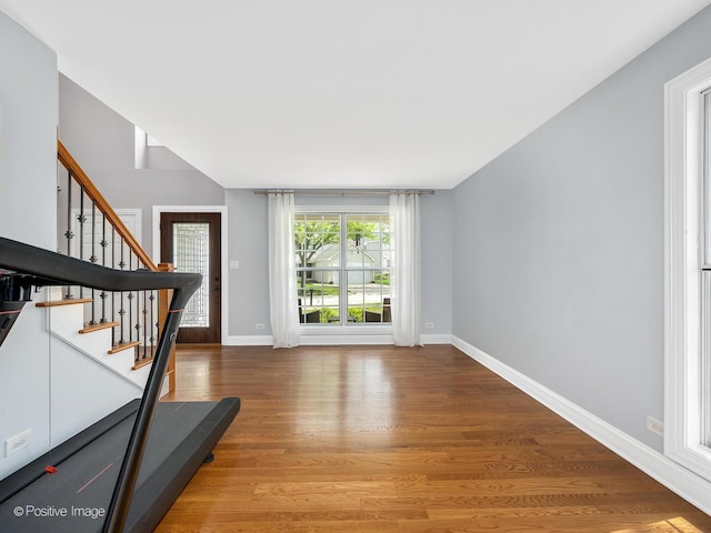 14 Wildflower Way, Streamwood, IL 60107 - entrance foyer with stairs, wood finished floors, and baseboards