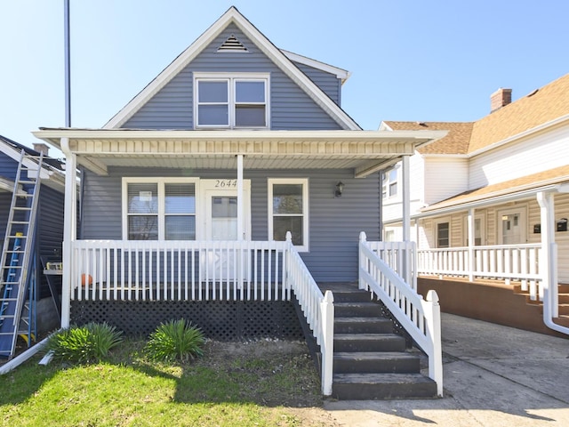 2644 Commercial Ave, South Chicago Heights, IL 60411 - bungalow featuring a porch