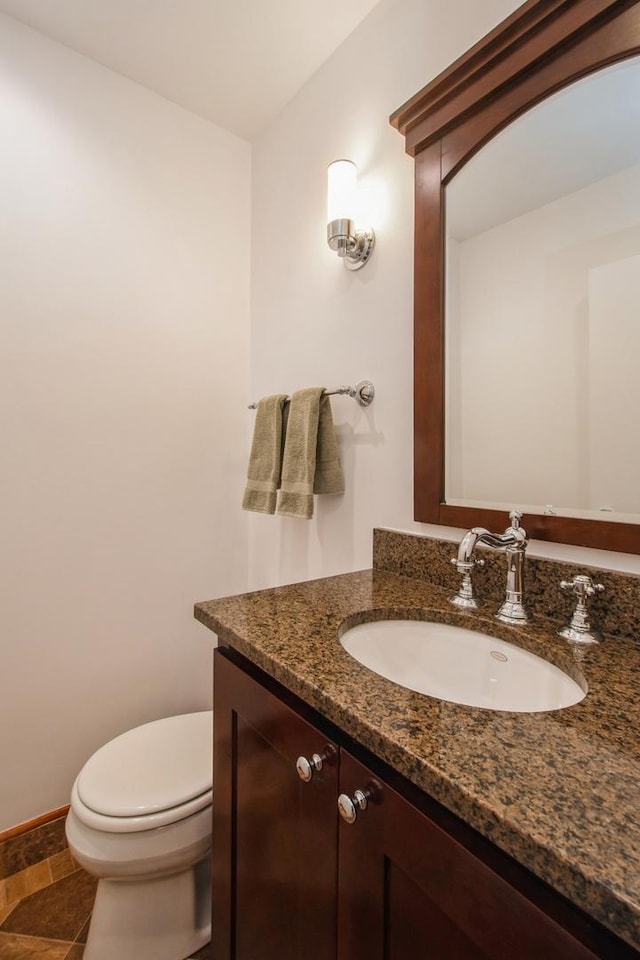 801 S Plymouth Ct Unit P, Chicago, IL 60605 - half bathroom with toilet, vanity, and baseboards