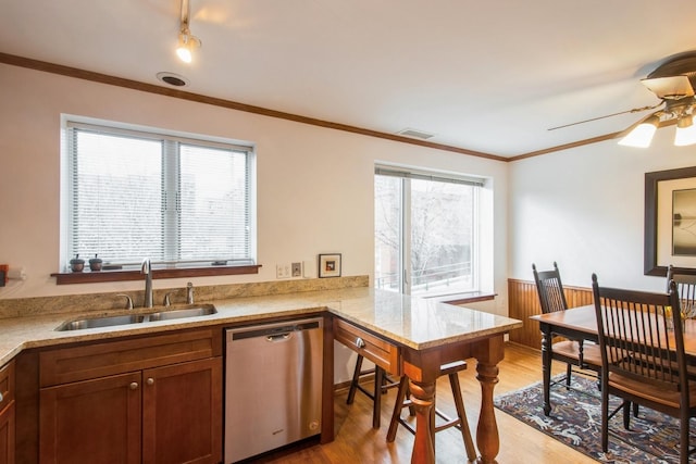 801 S Plymouth Ct Unit P, Chicago, IL 60605 - kitchen with light wood-style floors, dishwasher, a sink, and plenty of natural light