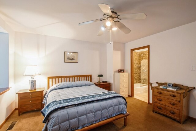 801 S Plymouth Ct Unit P, Chicago, IL 60605 - bedroom featuring baseboards, ensuite bathroom, a ceiling fan, visible vents, and light colored carpet