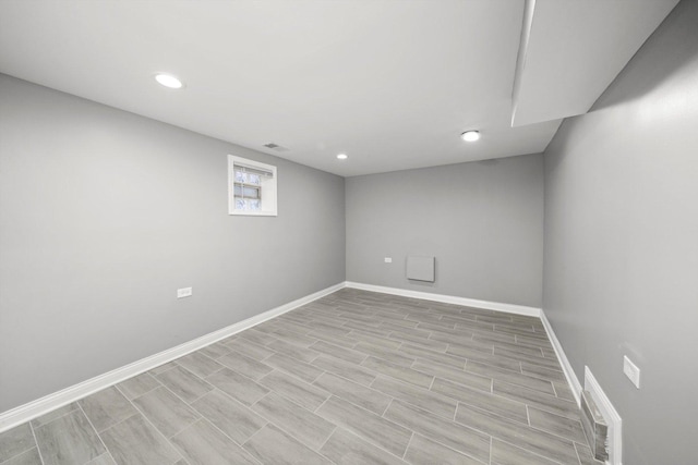 125 W 103rd Pl, Chicago, IL 60628 - basement with baseboards, visible vents, and recessed lighting