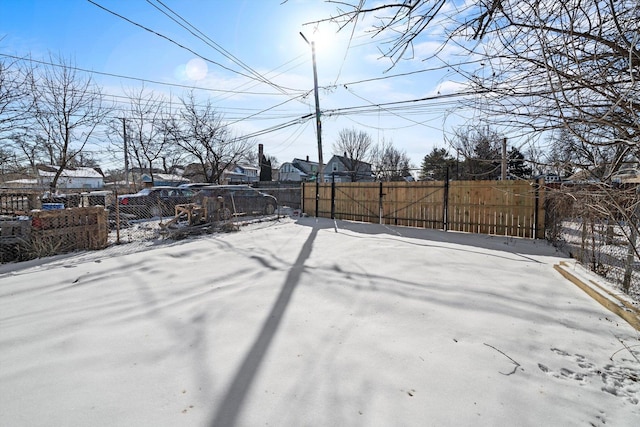 125 W 103rd Pl, Chicago, IL 60628 - snowy yard with fence private yard