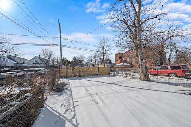 125 W 103rd Pl, Chicago, IL 60628 - yard layered in snow with fence