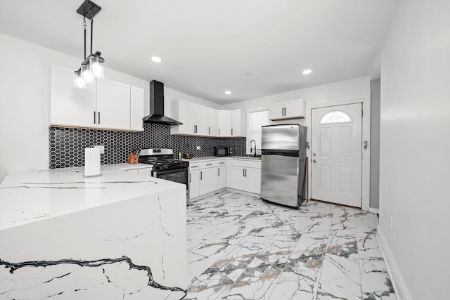 125 W 103rd Pl, Chicago, IL 60628 - kitchen with tasteful backsplash, wall chimney range hood, white cabinetry, appliances with stainless steel finishes, and light stone counters