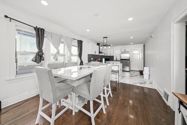 125 W 103rd Pl, Chicago, IL 60628 - dining area with dark wood-type flooring, baseboards, visible vents, and recessed lighting