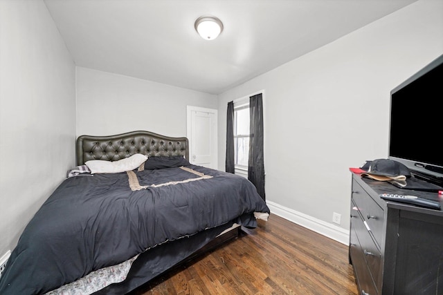 125 W 103rd Pl, Chicago, IL 60628 - bedroom with dark wood-type flooring and baseboards
