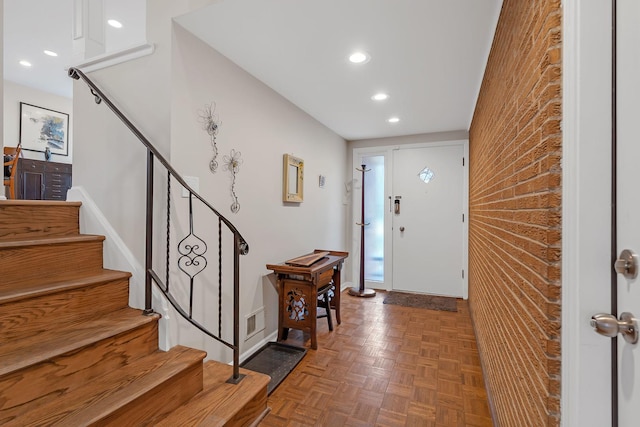 entrance foyer featuring stairway, baseboards, recessed lighting, and visible vents