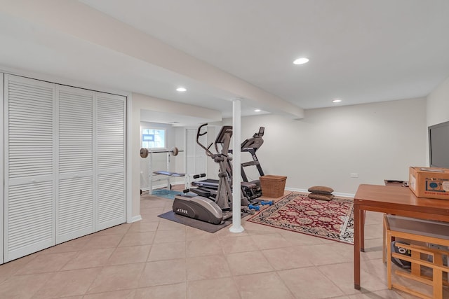 workout room with light tile patterned floors, baseboards, and recessed lighting