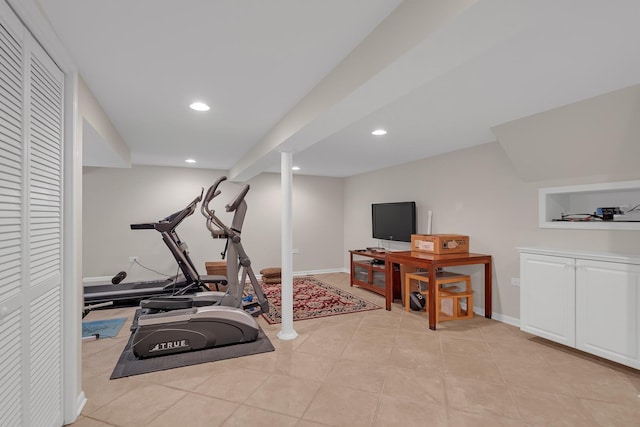 workout room featuring recessed lighting and light tile patterned flooring