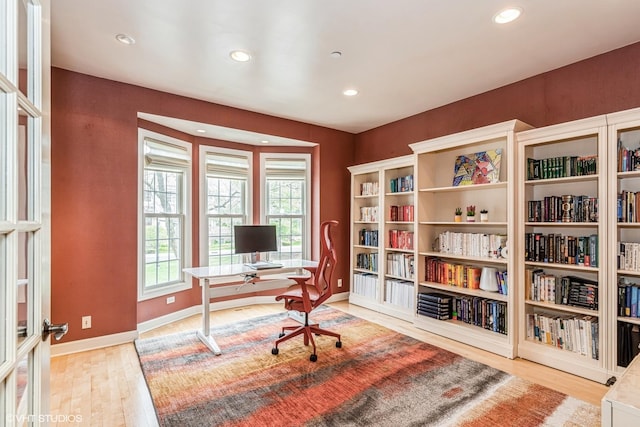 office area with recessed lighting, wood finished floors, and baseboards