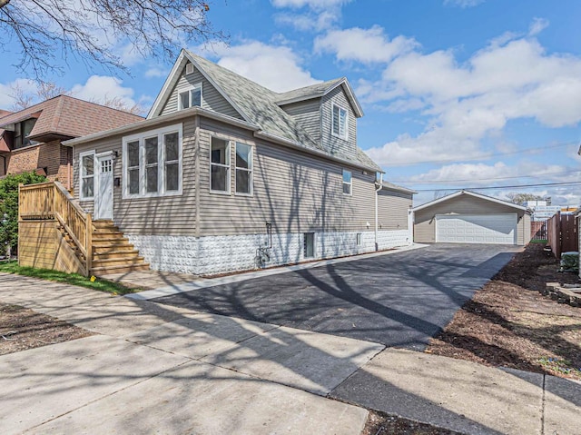 4051 Prairie Ave, Schiller Park, IL 60176 - view of side of home featuring an outbuilding and a garage