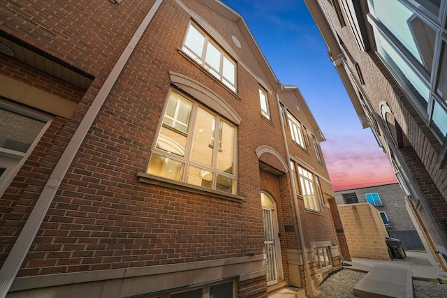 view of property at dusk