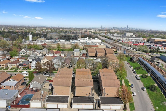 birds eye view of property with a residential view