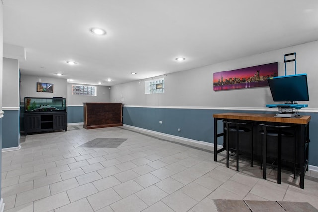701 N 4th Ave, Maywood, IL 60153 - interior space with recessed lighting, baseboards, tile patterned flooring, and indoor bar
