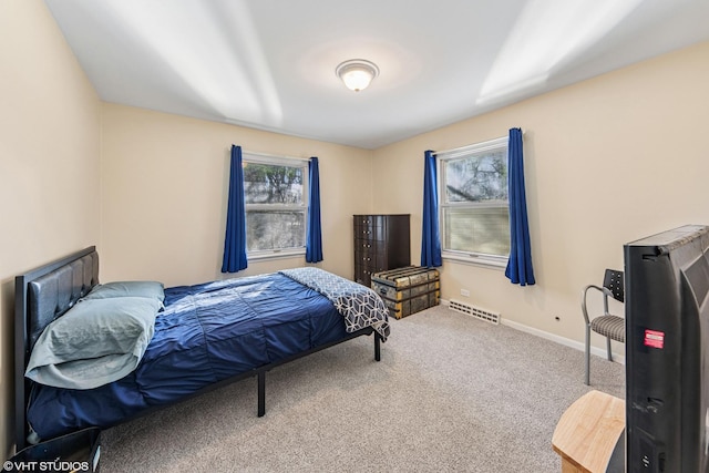 carpeted bedroom with visible vents and baseboards