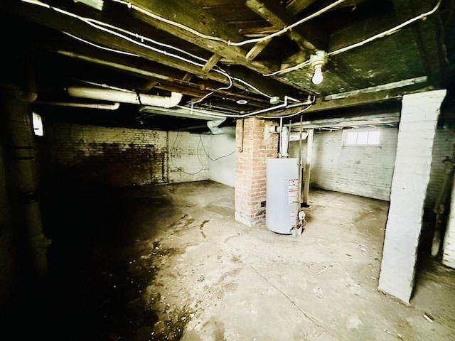 basement featuring gas water heater