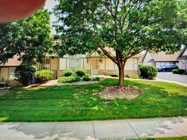 1700 Willow Circle Dr, Crest Hill, IL 60403 - view of front facade featuring a front yard