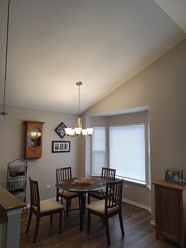 dining space featuring a chandelier, baseboards, dark wood-style floors, and vaulted ceiling