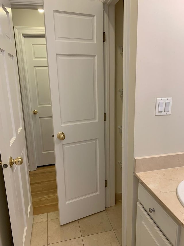 bathroom with vanity and tile patterned floors
